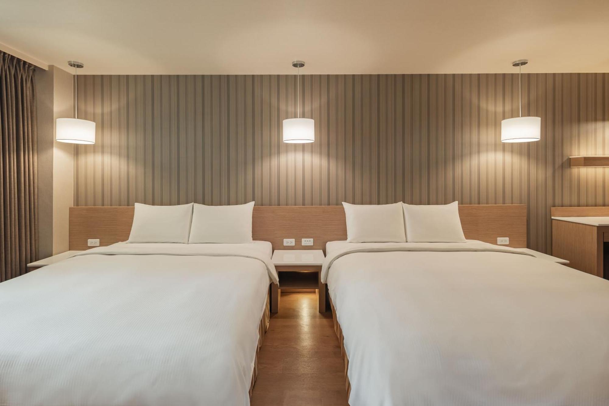 Kindness Hotel-Jue Ming Kaohsiung Kamer foto