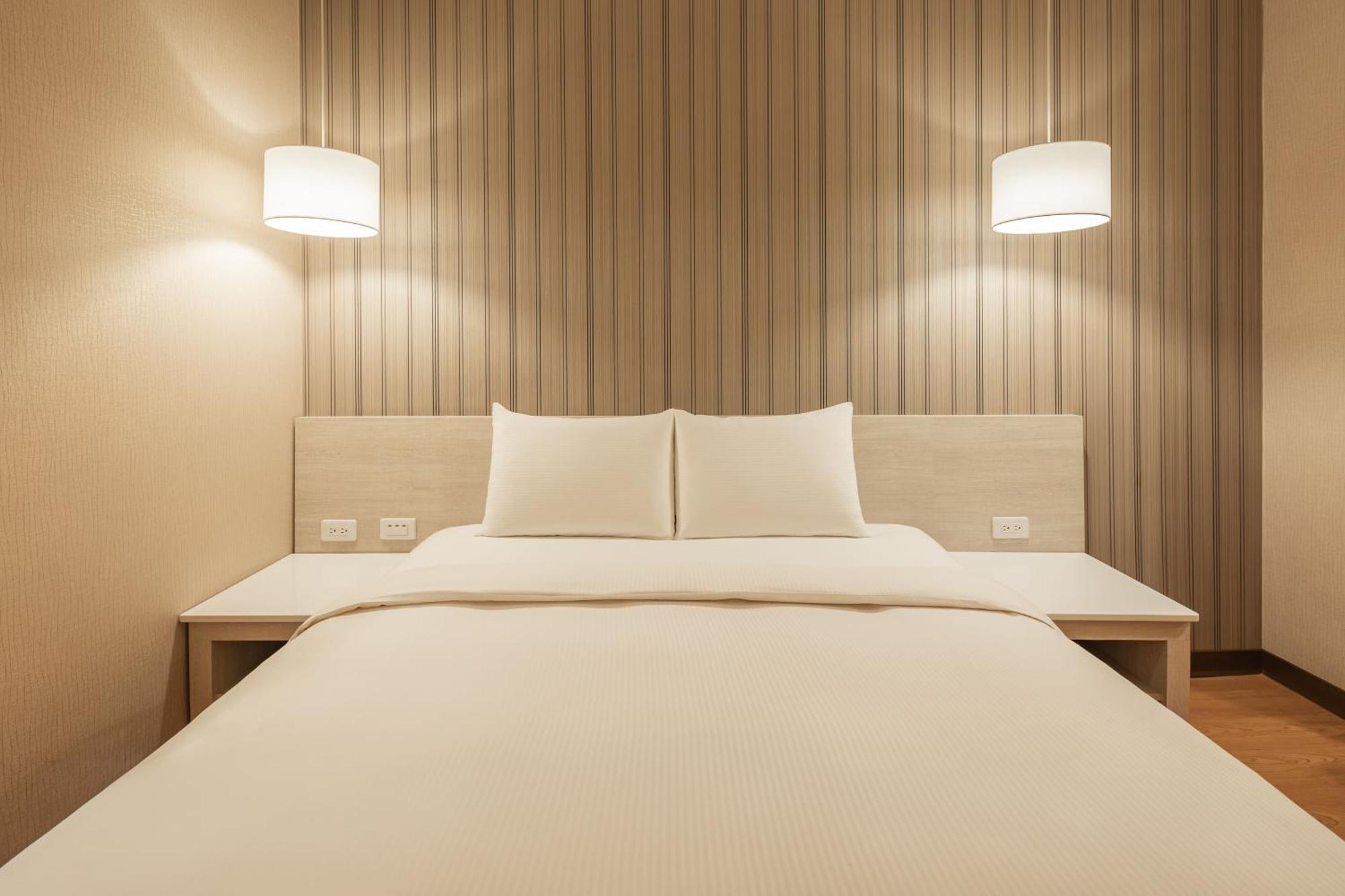 Kindness Hotel-Jue Ming Kaohsiung Kamer foto