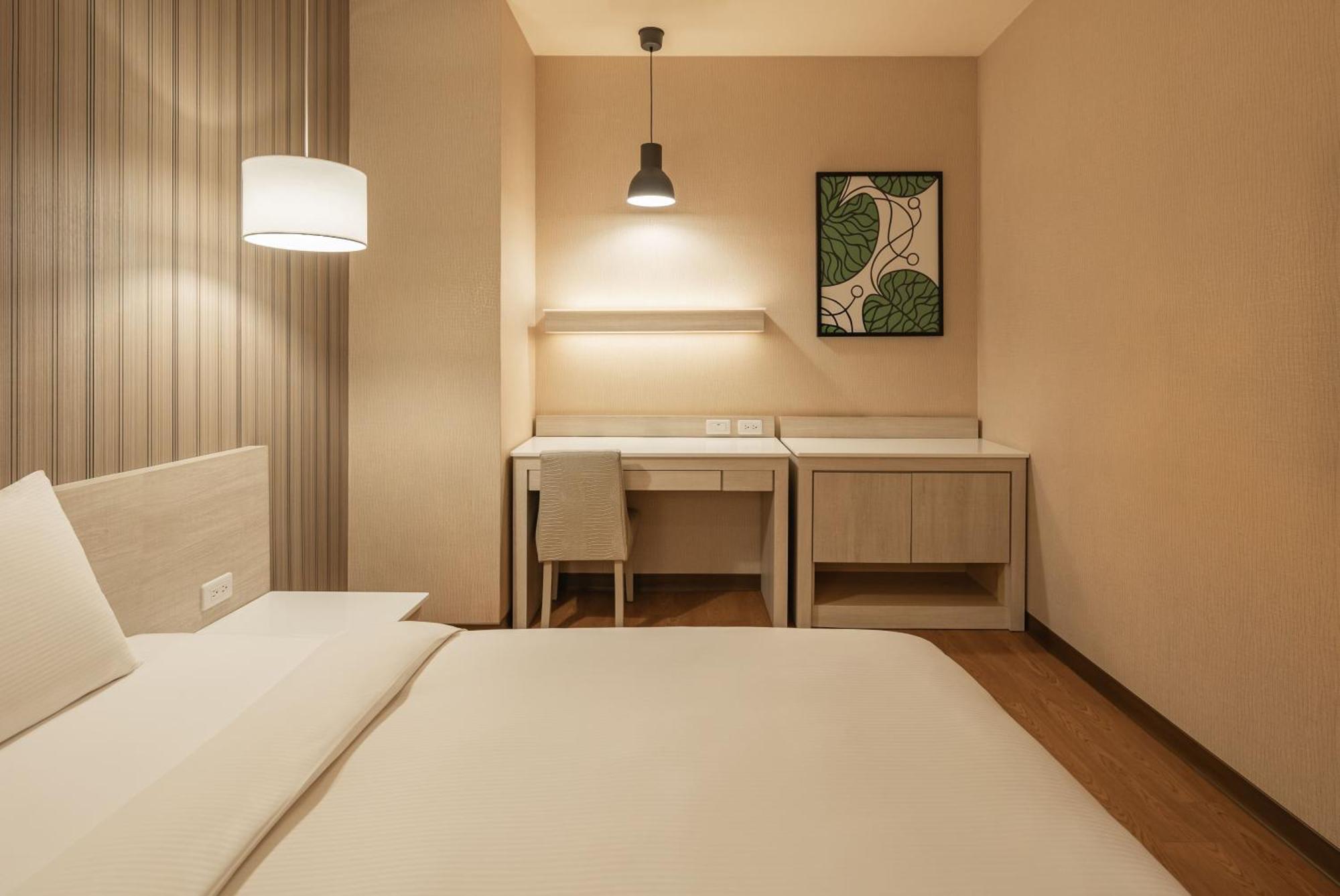 Kindness Hotel-Jue Ming Kaohsiung Kamer foto