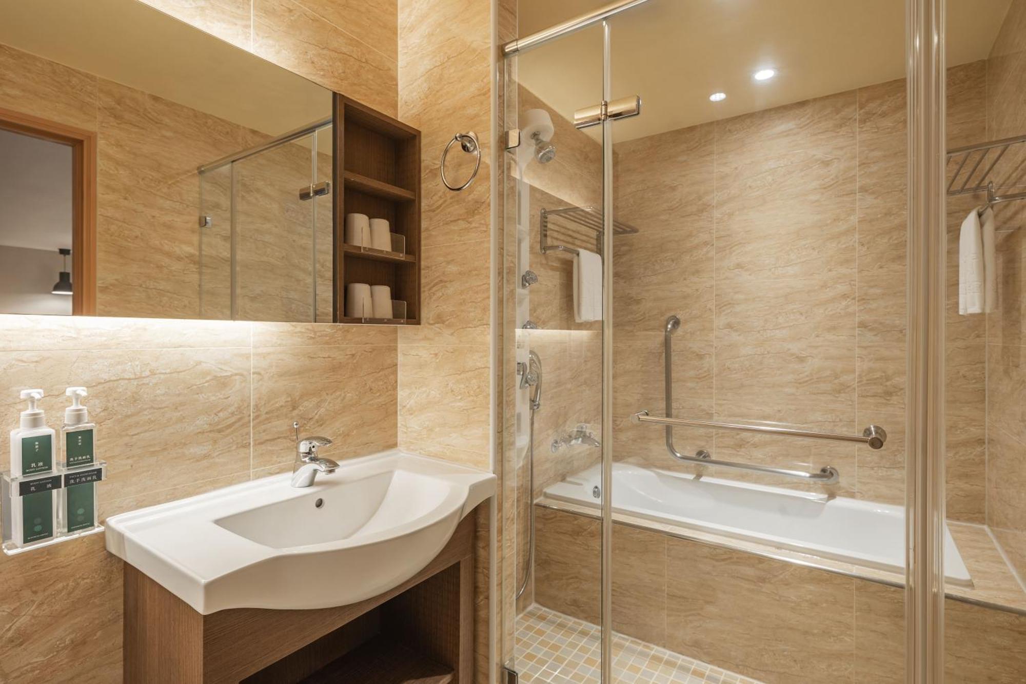 Kindness Hotel-Jue Ming Kaohsiung Kamer foto