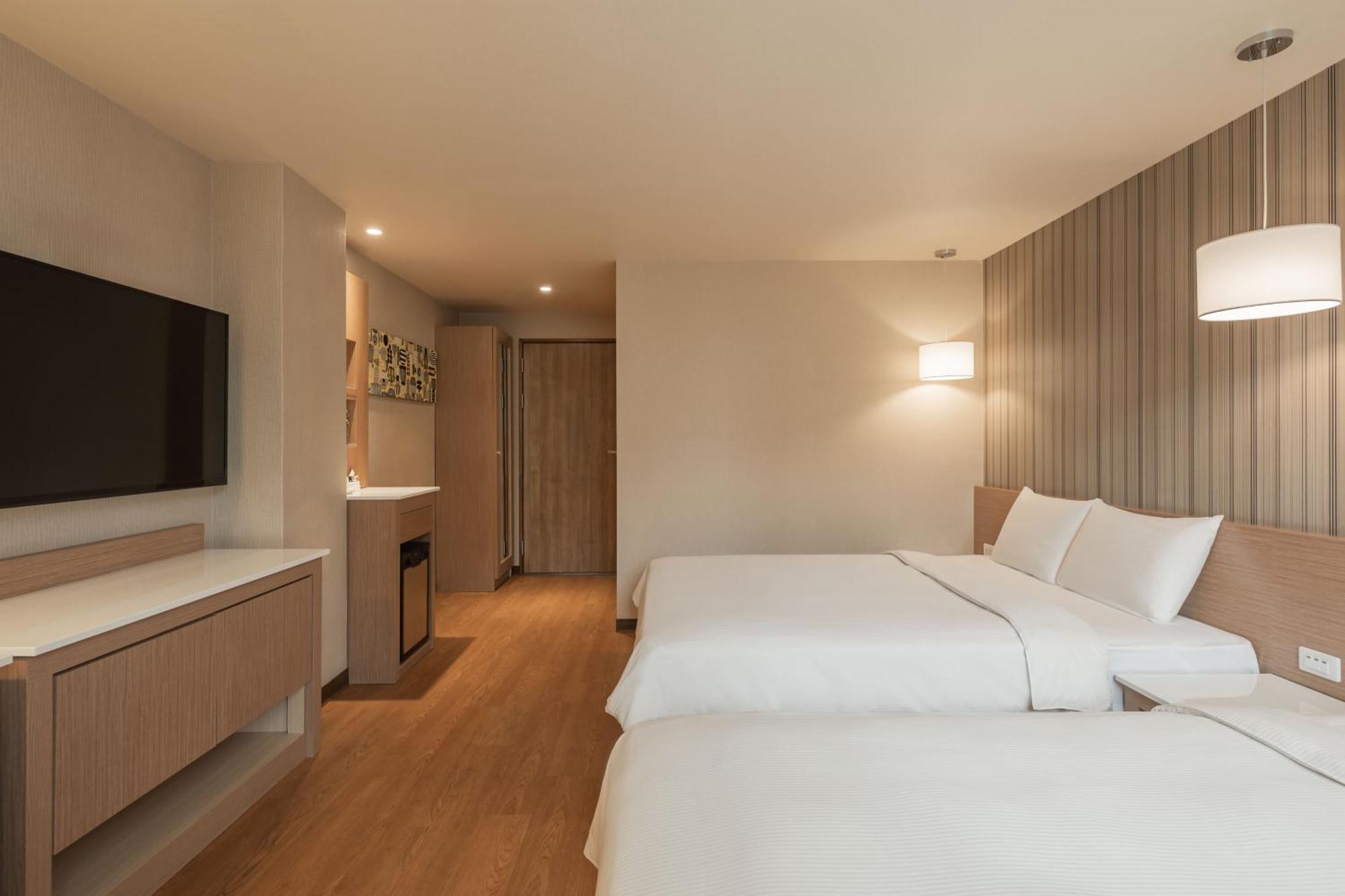 Kindness Hotel-Jue Ming Kaohsiung Kamer foto