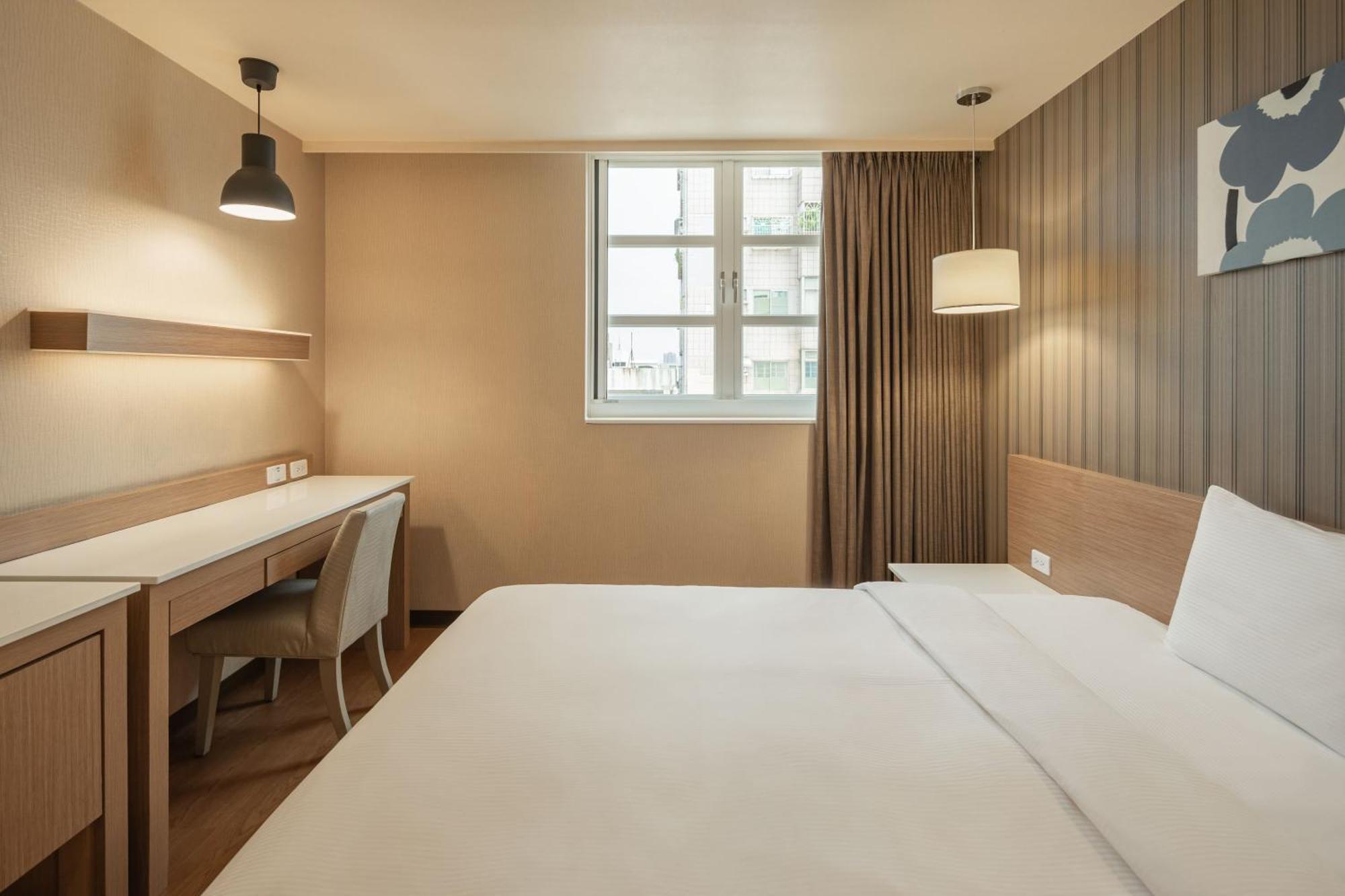 Kindness Hotel-Jue Ming Kaohsiung Kamer foto